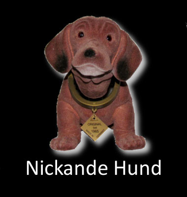 nickande hund knapp